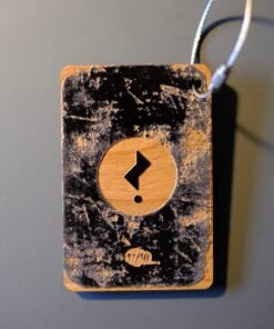 Issue 3’s limited special edition Falling Man wooden bag tag