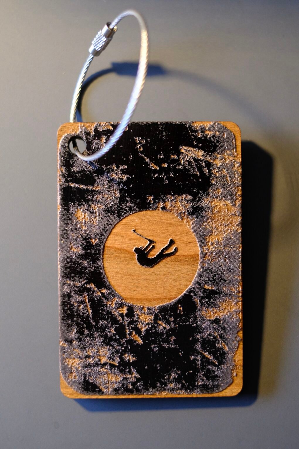 Issue 3’s limited special edition Falling Man wooden bag tag - Image 3