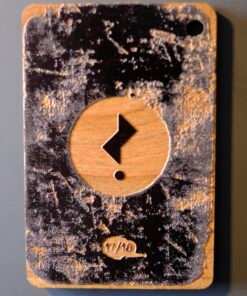 Alternative view of Issue 3’s limited special edition Falling Man wooden bag tag